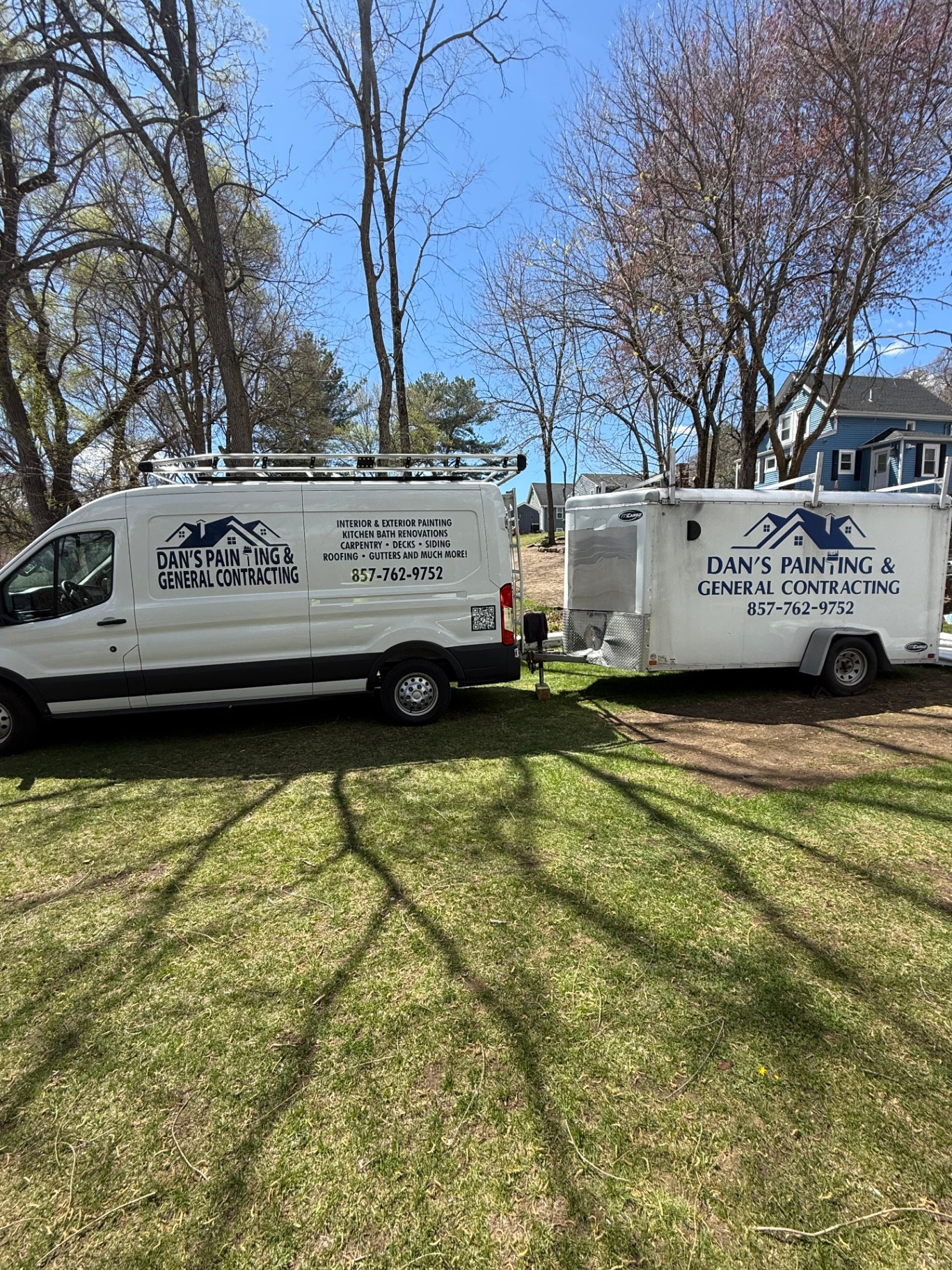 Dan's Painting & General Contracting work van and enclosed job-site trailer parked on a job in Newton, MA